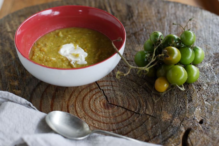 Green tomato and red lentil soup